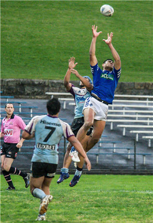 Daniel leaps above the pack for a sensational try