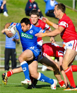 Poweringforward for one of his three Rd12 tries