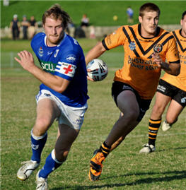 Matt Hall races to cut off the Tigers attack