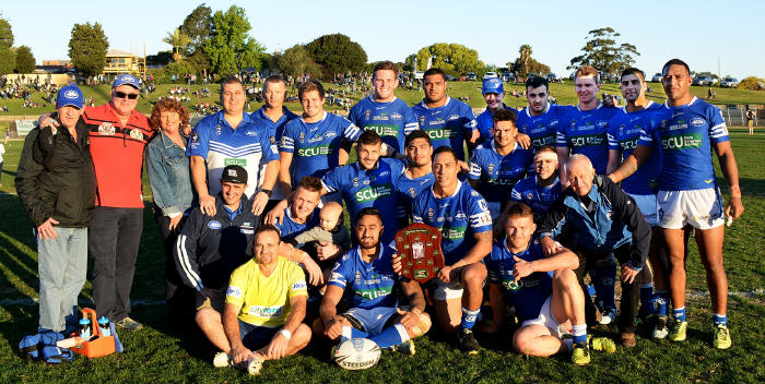 Michael and Patrick Hyde and Maria Harkness join with the victorious Newtown Jets (winners of the Frank Hyde Shield for 2015) at Henson Park on Saturday. Photo: Michael Magee Photography.

