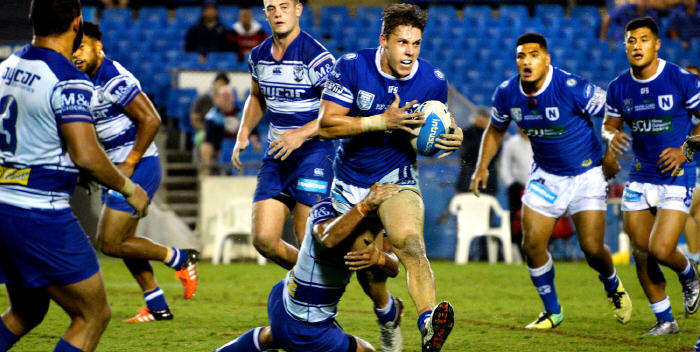 Newtown winger Jacob Gagan was in top form against the Canterbury Bulldogs at Belmore Sports Ground on Friday night. Two of his Jets team-mates Malakai Houma (on the left) and Fa’amanu Brown are also in this action shot taken by Mike Magee. Photo: Michael Magee Photography.
