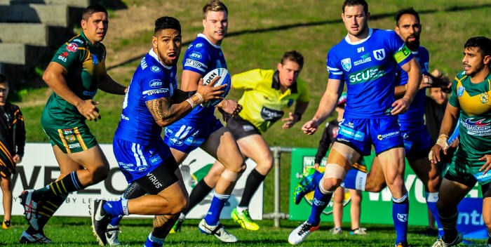 High-performance Newtown Jets front-rower Jesse Sene-Lefao looks to get his pass away against Wyong, with his team-mates Jordan Drew, Mitch Brown and Travis Robinson in the background. Photo: Gary Sutherland Photography.