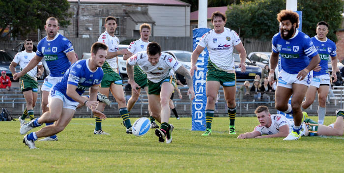 Follow the bouncing ball … Jets winger Matt Evans is pictured about to score Newtown’s first try against Wyong at Henson Park last Saturday. Other Jets players in the photo are (from left to right): Anthony Moraitis, Junior Roqica and Jaline Graham. Photo: Michael Magee Photography.
