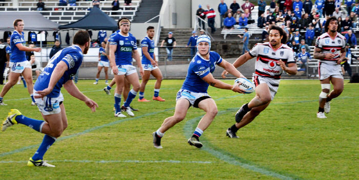Newtown five-eighth Josh Cleeland is pictured about to fire out a pass when the Jets and the New Zealand Warriors last met at Henson Park back on the 18th June. The Jets defeated the then-competition leaders 38-6 that day and no doubt all  Newtown supporters will be hoping for a repeat performance out at Penrith on Sunday evening. Photo: Michael Magee
