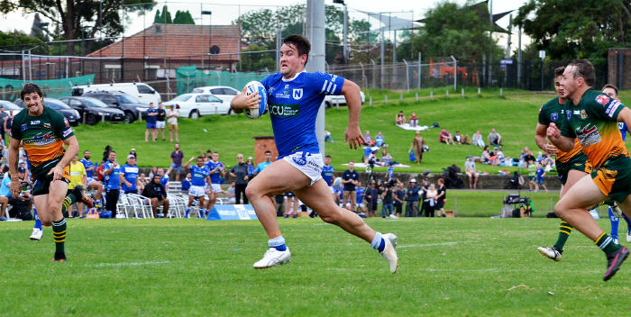 Newtown Jets second-rower Jayden Walker is pictured in full flight as he races away to score against Wyong at Henson Park. Photo: Michael Magee Photography
