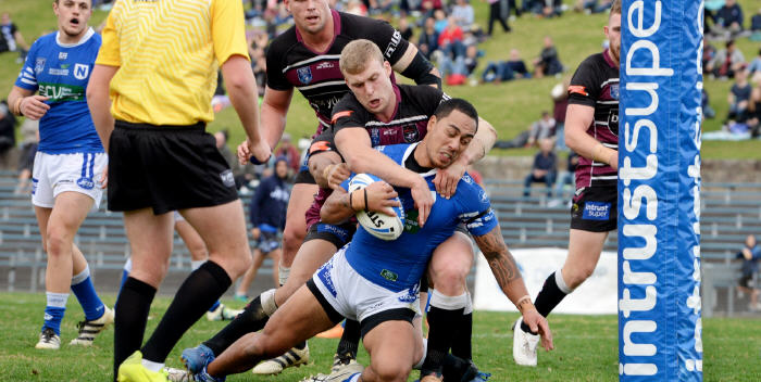 Newtown hooker Kurt Kara goes very close to scoring in the first half against the Blacktown Workers Sea Eagles at Henson Park on Saturday. Jets front-rower Jimmy Jolliffe is in the background. Photo:
Michael Magee Photography.
