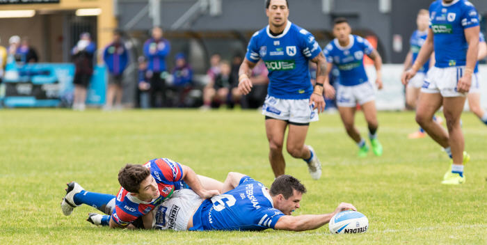 Newtown Jets five-eighth Daniel Mortimer scoring a remarkably-determined individual try against the Newcastle Knights in the 14 Round ISP NSW match played at Cessnock Sports Ground on Saturday. Photo: MAF Photography (Mario Facchini)
