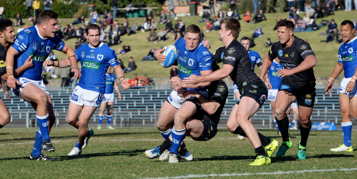 Newtown Jets backrower Jack Williams takes on the Mounties defence at Henson Park last Saturday. The other identifiable Jets players in the photo are (from left to right) Kurt Dillon, Adam Clydsdale, Jaimin Jolliffe and Joseph Paulo. Photo: Michael Magee Photography.
