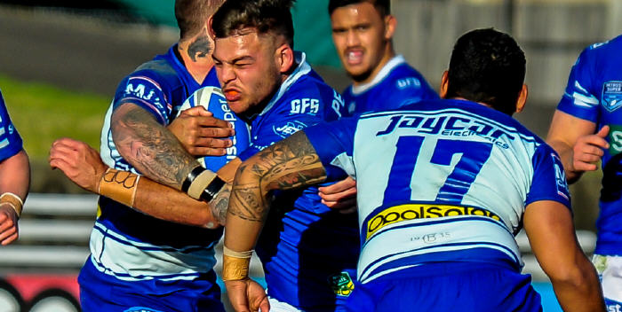 Newtown Jets backrower Jayden McDonogh strives to break through the Canterbury Bulldogs defence at Belmore Sports Ground last Saturday. Photo: Gary Sutherland Photography
