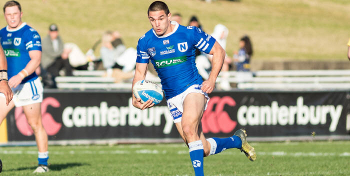 Newtown Jets halfback Luke Towers is about to put on a step at Belmore on Saturday afternoon that showed why he was the Toast of the French Rugby League in recent seasons. Photo: Mario Facchini (MAF Photography)
