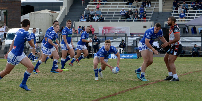 Newtown Jets hooker Blayke Brailey sets things in motion as he sends out a pass to halfback Kyle Flanagan at Henson Park on Saturday afternoon. Photo: Mike Magee Photography
