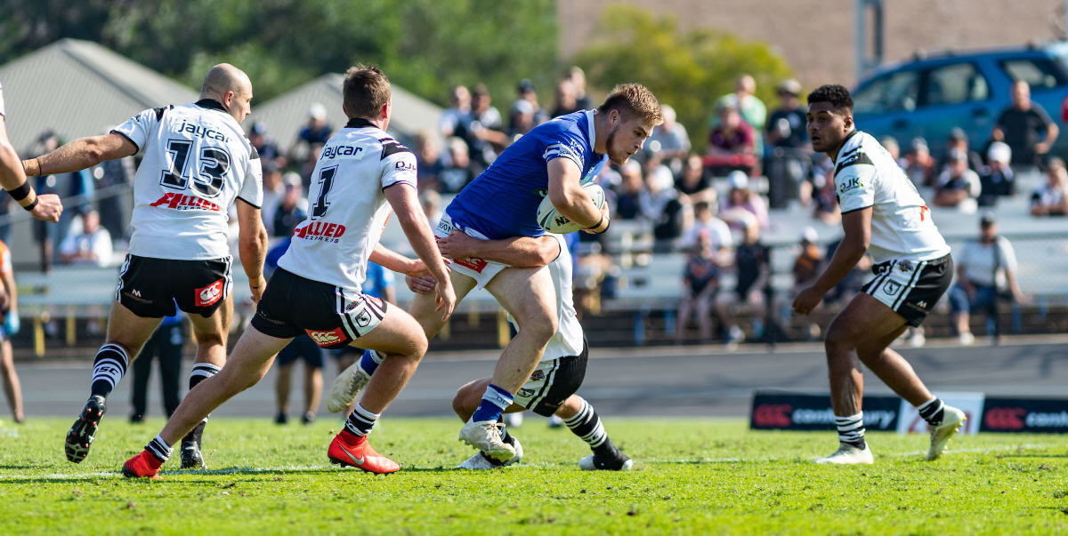 Newtown Jets hard-working front-rower Daniel Vasquez takes on the Western Suburbs forwards defence at Lidcombe Oval last Sunday. Photo: Mario Facchini, mafphotography