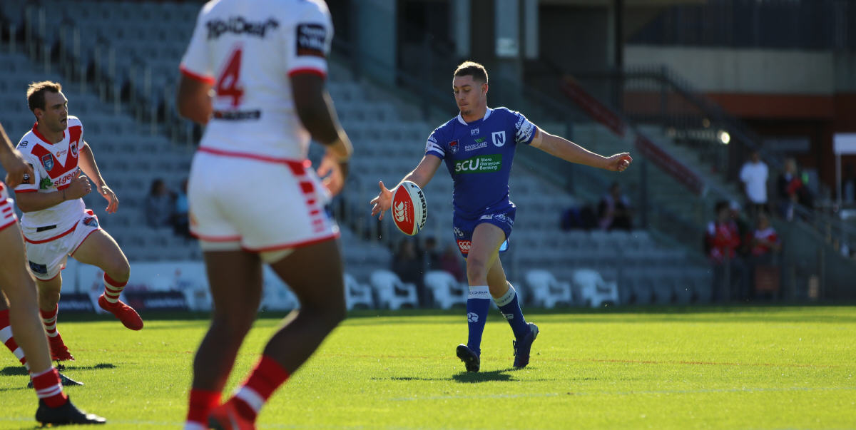 Newtown’s mercurial number 6, Jack A. Williams, gets his kick away against the St George-Illawarra Dragons at WIN Stadium, Wollongong last Sunday. Photo: Gary Dover, Cronulla Sharks Media.