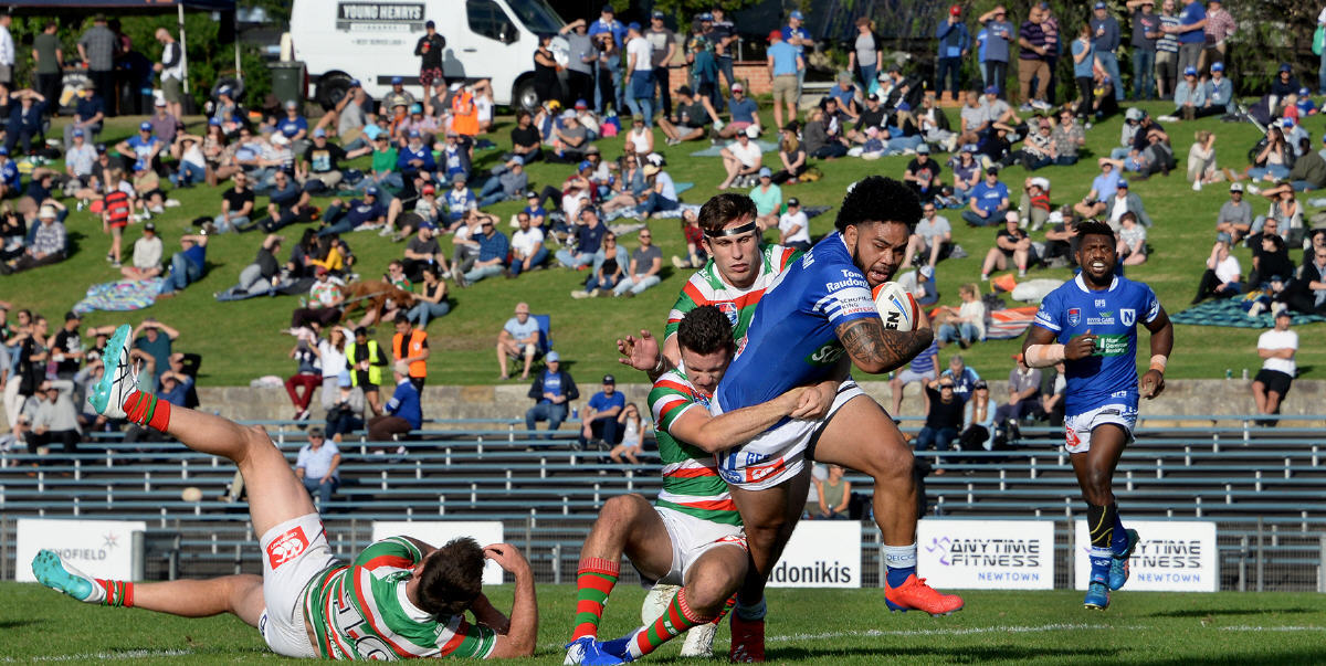 Newtown Jets second-rower Siosifa Talakai displays tremendous leg drive as he powers his way through the South Sydney Rabbitohs defence at Henson Park on Saturday. Photo: Michael Magee Photography