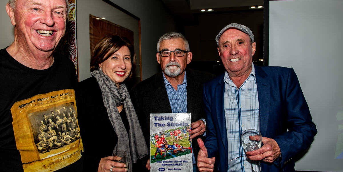 These regular habitués of inner-city book launches were on hand at last Monday’s event at the Better Read Than Dead Bookshop. From the left: Terry Rowney (Newtown RLFC Director and sponsor), Olga Lauricella (Newtown RLFC Administration Manager), Glen Dwyer (the author, Newtown RLFC Director and Media Officer) and John Lynch (renowned Newtown RLFC bon vivant, Henson Park ground announcer, Mr 8972 and former Newtown RLFC Director). Photo: Gary Sutherland.
