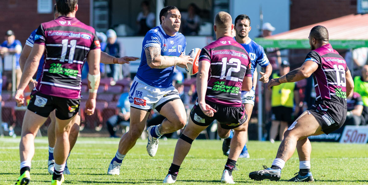 Newtown Jets front-rower Wes Lolo drives hard into the Blacktown Workers Sea Eagles defensive line in last Saturday’s Canterbury Cup match played at Lottoland. Photo:
Mario Facchini, mafphotography
