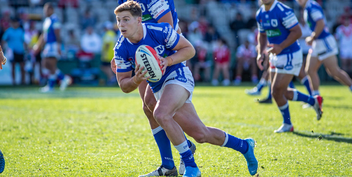 Newtown Jets hooker Blayke Brailey moves forward with the ball in Sunday’s hard-fought preliminary final win against the St George-Illawarra Dragons. Photo: Mario Facchini, mafphotography