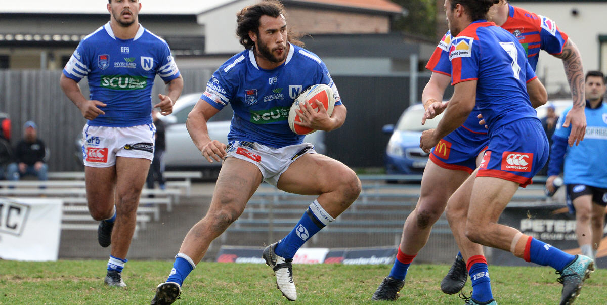 Impressive Newtown Jets back-rower Toby Rudolf looks to wrong-foot the Newcastle Knights defence at Henson Park on Saturday. Photo: Michael Magee Photography.