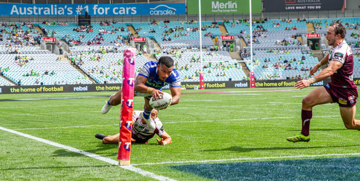 Newtown Jets winger Sione Katoa scores his second try just five minutes out from full-time at ANZ Stadium last Sunday. Photo: Mario Facchini, mafphotography