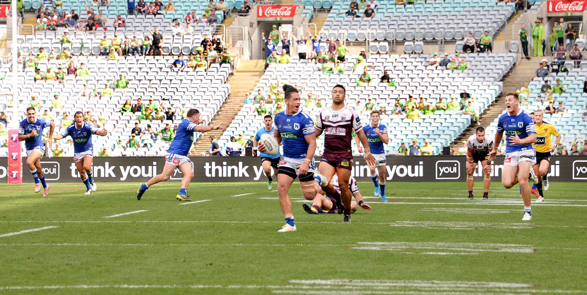 On 6th October 2019 at ANZ Stadium, the Newtown Jets defeated Burleigh Bears 20-16 in the NRL State Championship Final. This win effectively made Newtown the best club team (outside of the NRL competition) in Australia, New Zealand and Papua-New Guinea. Newtown centre Jackson Ferris (with the ball) is shown sprinting away for the winning try with less than ten seconds of regular time left to play, having seized upon a pin-point short kick by his team-mate Billy Magoulias. Newtown had trailed 10-2 at half-time and 16-14 going into the last ten seconds of the match. Photo: Michael Magee Photography