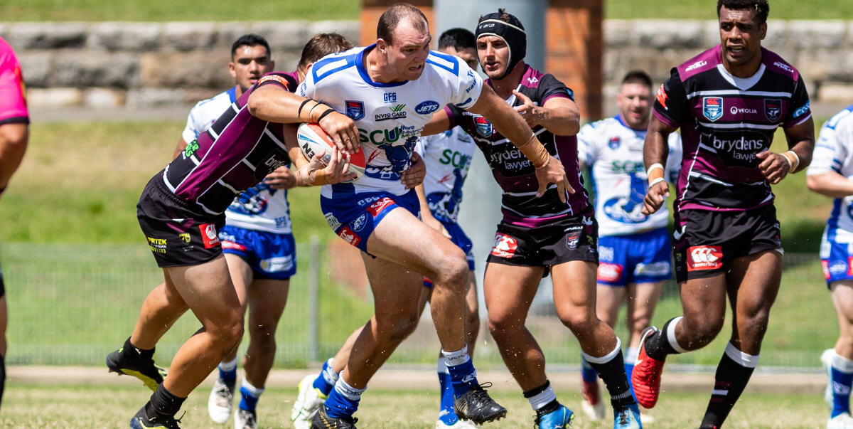 Newtown Jets front-rower Thomas Hazelton (a Goulburn Workers and Cronulla Sharks Jersey Flegg product) breaks through the Blacktown Workers Sea Eagles defence at Henson Park on Sunday. Photo: Mario Facchini, mafphotography