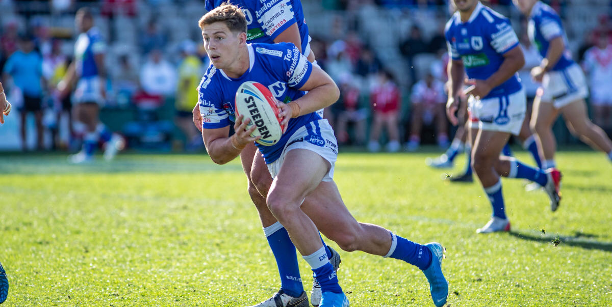 Newtown Jets hooker Blayke Brailey moves forward with the ball in Sunday’s hard-fought preliminary final win against the St George-Illawarra Dragons. Photo: Mario Facchini, mafphotography