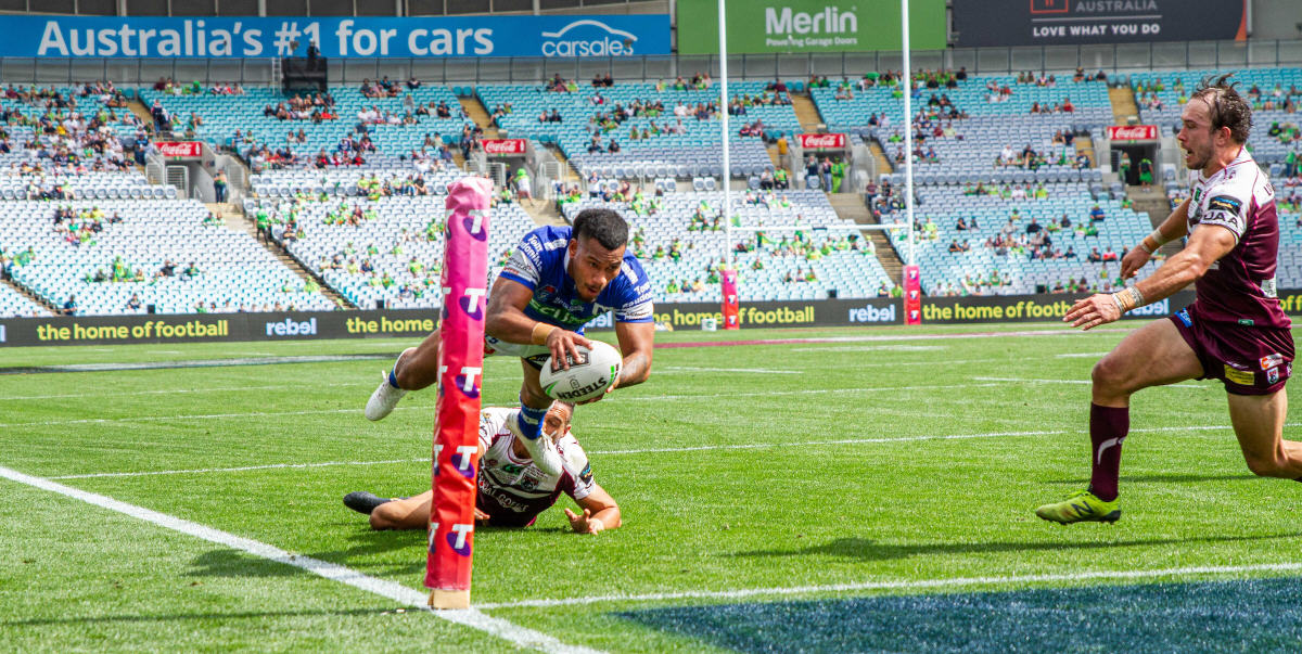 Newtown Jets winger Sione Katoa scores his second try just five minutes out from full-time at ANZ Stadium last Sunday. Photo: Mario Facchini, mafphotography