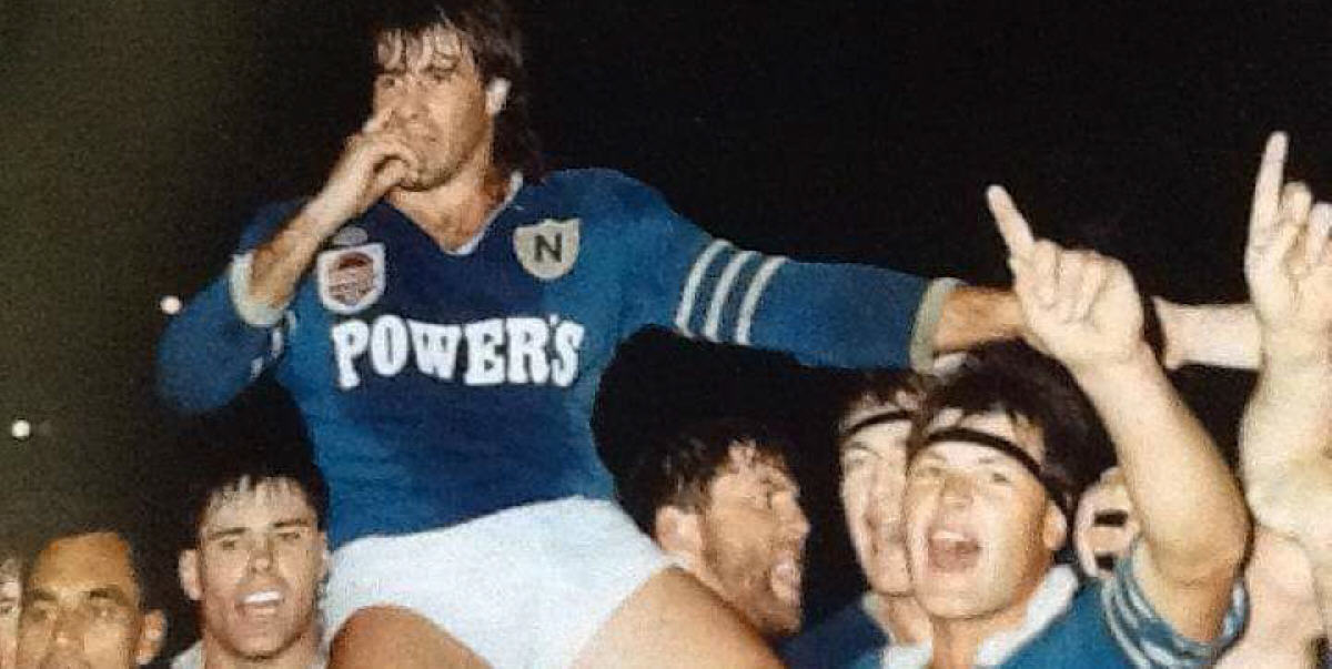 Fred Teasdell is carried shoulder-high by his Jets team-mates following Newtown’s thrilling victory in the 1992 Metropolitan Cup first grade grand final.
Photo: Newtown RLFC.
