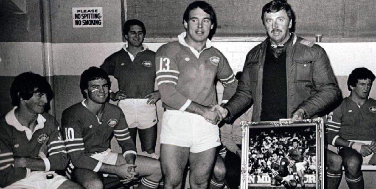Jets coach Warren Ryan presents Bill Noonan with a special award prior to his final appearance with Newtown at Henson Park on Sunday, 31st August 1980. (NSWRL photo).