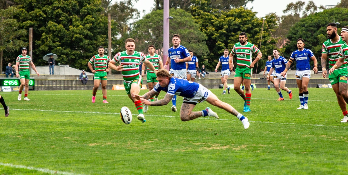 Jets hooker Jayden Berrell displays typical guile and quick-wittedness in scoring Newtown’s first try on Saturday. Photo: Mario Facchini / mafphotography