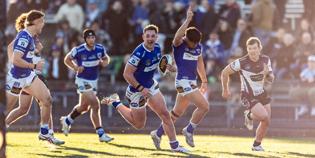 Newtown Jets left-edge backrower Kyle Pickering (in possession) about to score at Henson Park on Saturday, 22nd July 2023. Jets fullback Manaia Waitere salutes the crowd after playing a clever role in setting up the try. (Photo: Mario Facchini, mafphotography)
