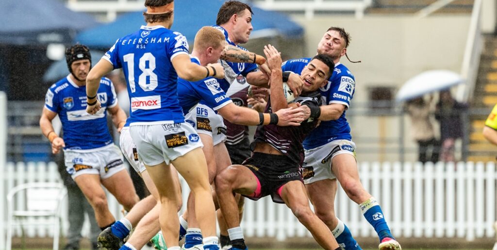 Tom Rodwell, Sam Healey (number 18), Brad Fearnley, Billy Burns and Addison Demetriou all feature in this photo which portrays the tough defence deployed in Saturday's match. (Photo: Mario Facchini/ mafphotography)